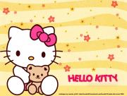 Hello Kitty en jaune et peluche