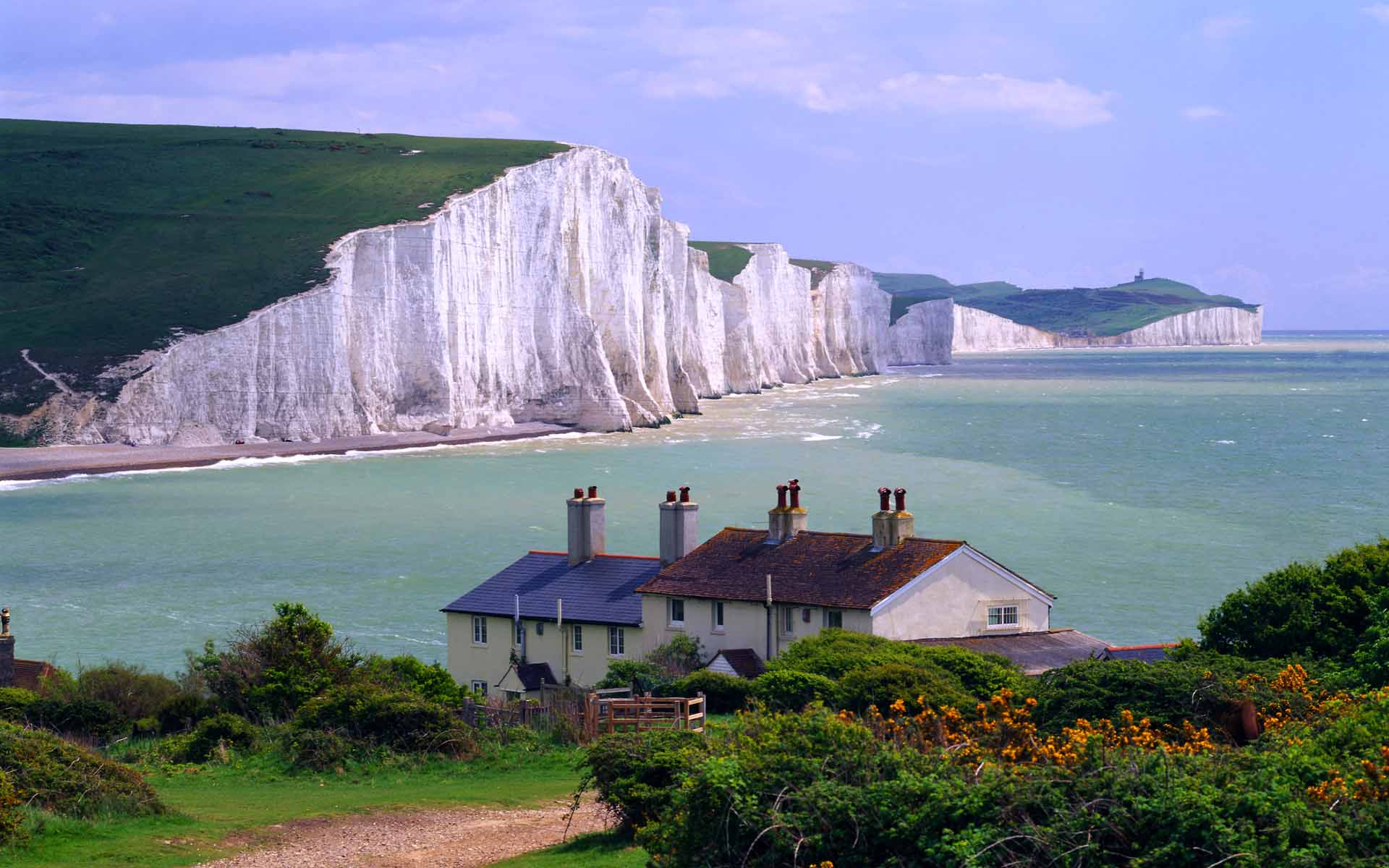 Fond d'ecran Maisons devant les falaises