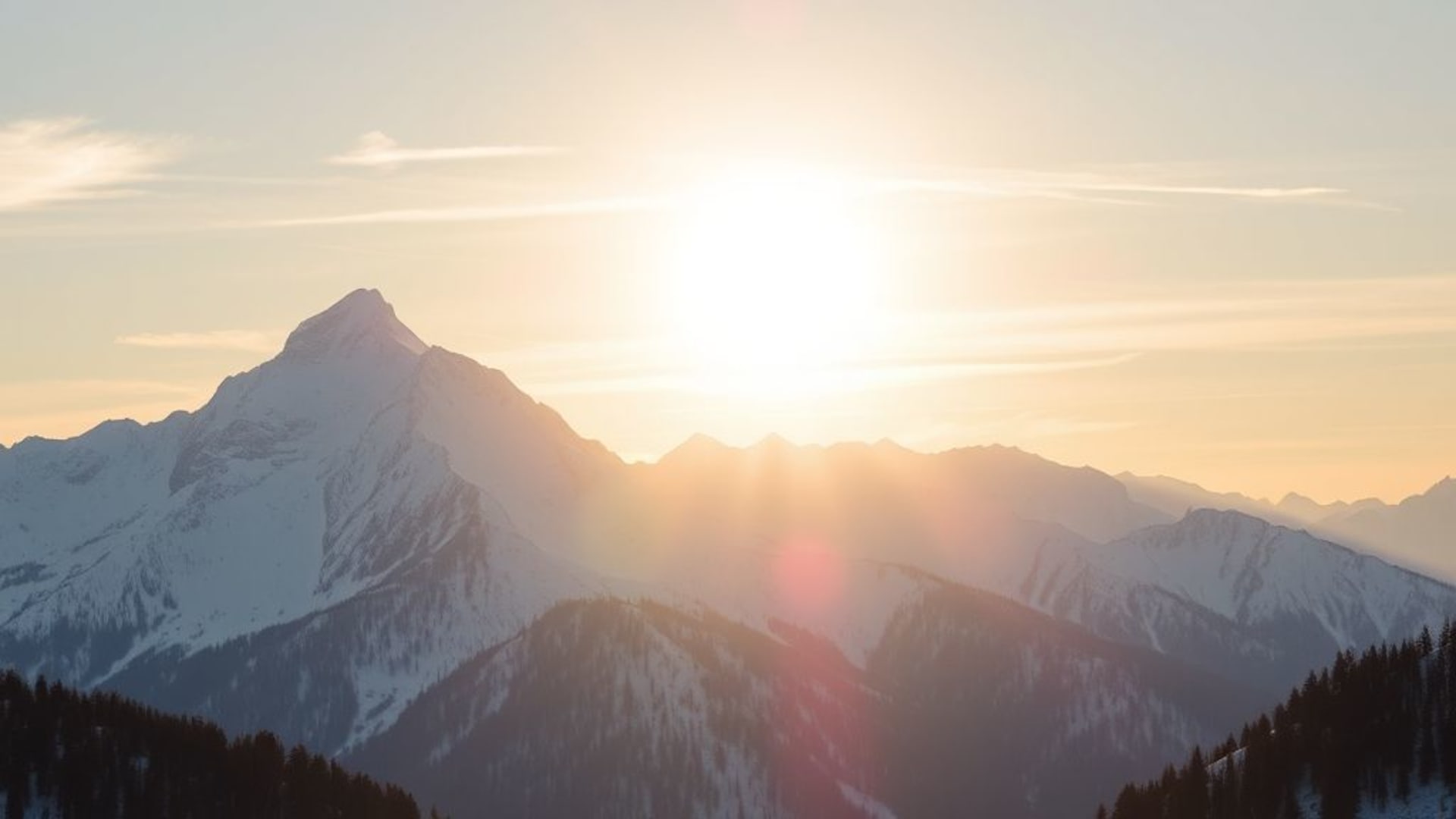 montagnes enneigées au lever du soleil avec couleurs pastel